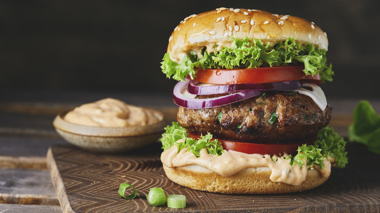 burger made with veggies with side of sauce