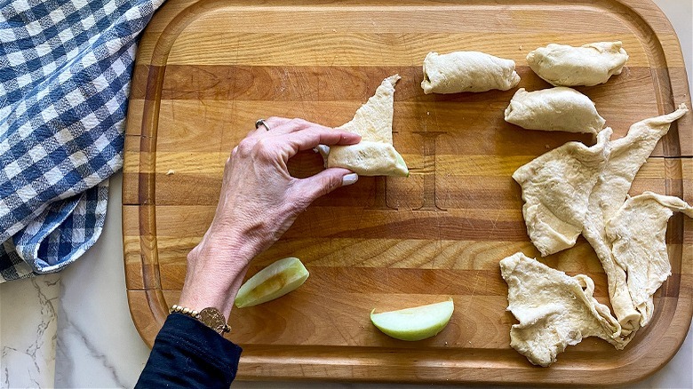 dough-wrapped apples in baking dish