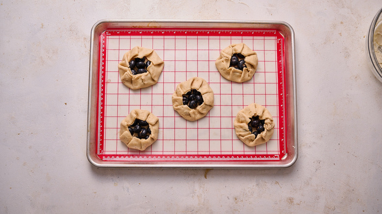 folded galettes on sheet tray