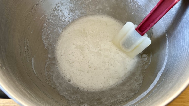 Heating meringue mixture over simmering water