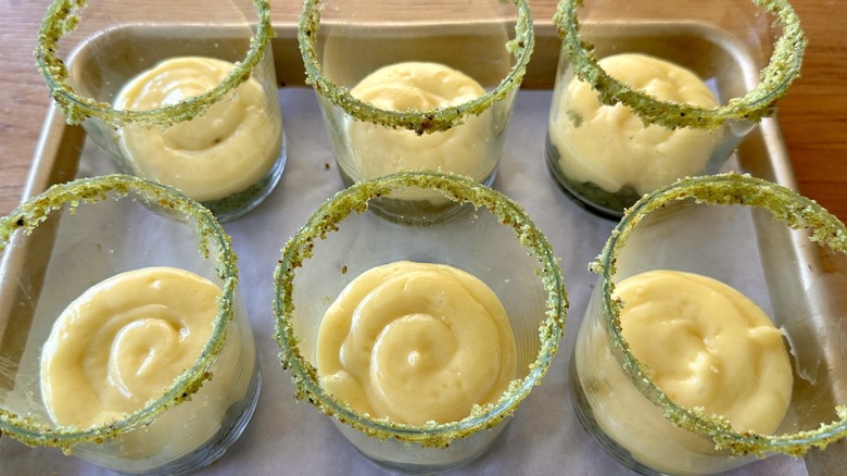 Lemon curd piped in glasses