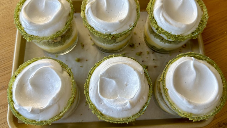 Swirled lemon meringue trifles with pistachios