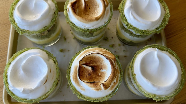 Blowtorched lemon pistachio meringue trifles