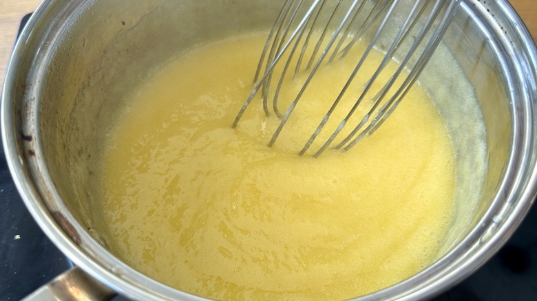 Thickened lemon curd in pot