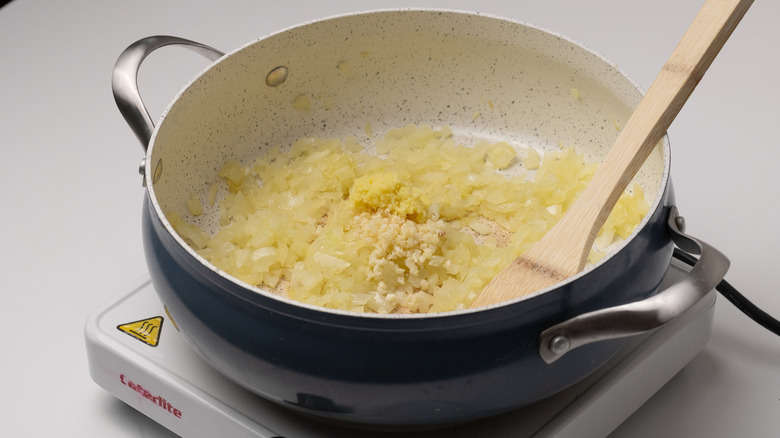 Sauteing onions, ginger, and garlic