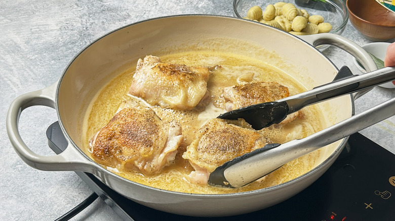 cooking chicken in skillet