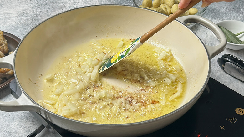 sauteeing onion in skillet