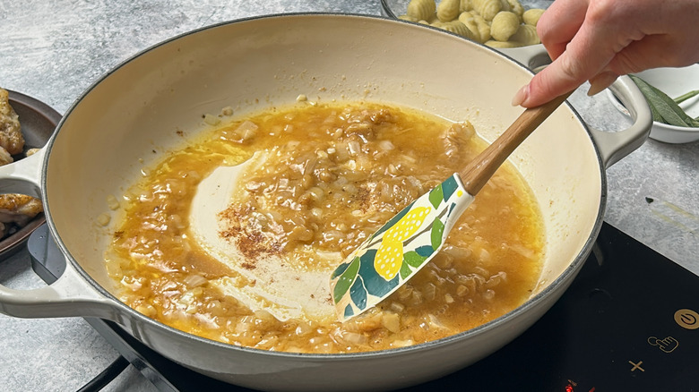 stirring miso sauce in pan