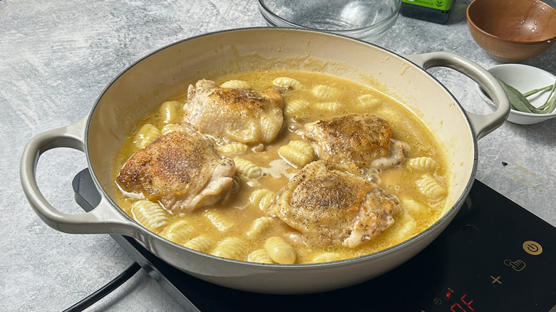 chicken and gnocchi in skillet