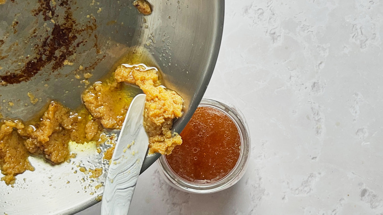 pouring butter into brandy