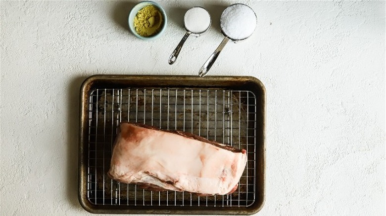 uncooked pork on tray 