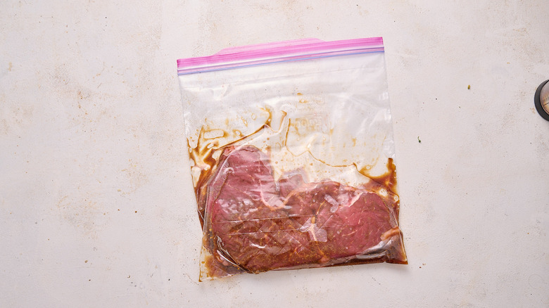 steak marinating in bag