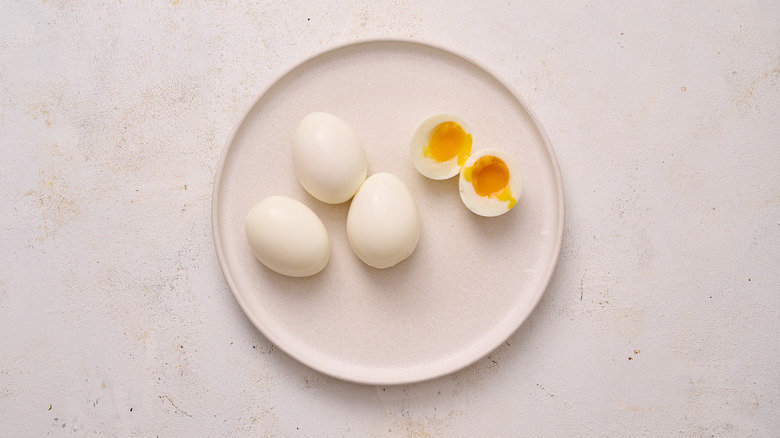 soft boiled eggs on plate