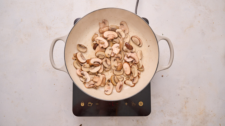 browning mushrooms in skillet