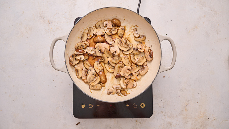 cooking mushrooms in skillet