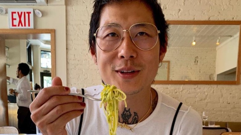 Danny Bowien wears glasses