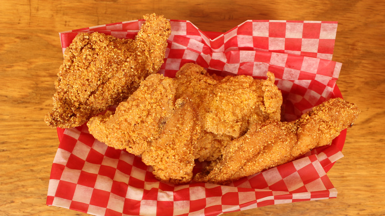 fried catfish fillets in basket