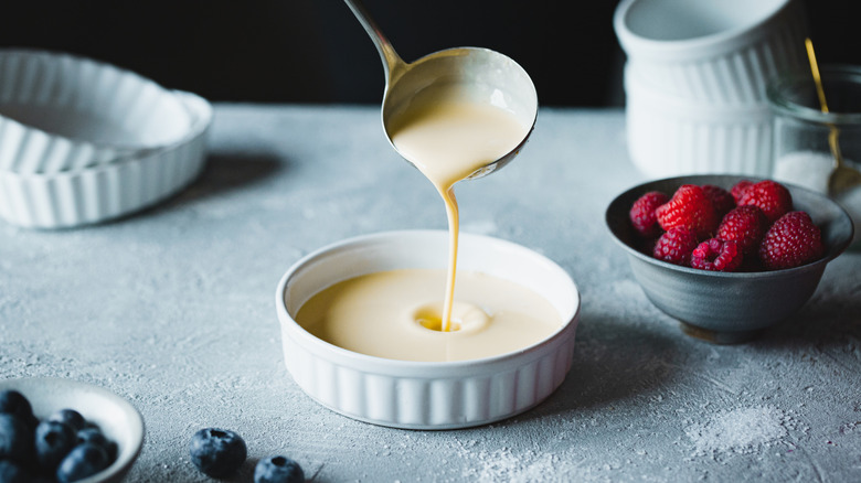 pouring custard into shallow dish