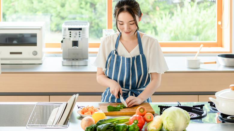 Person chopping vegetables