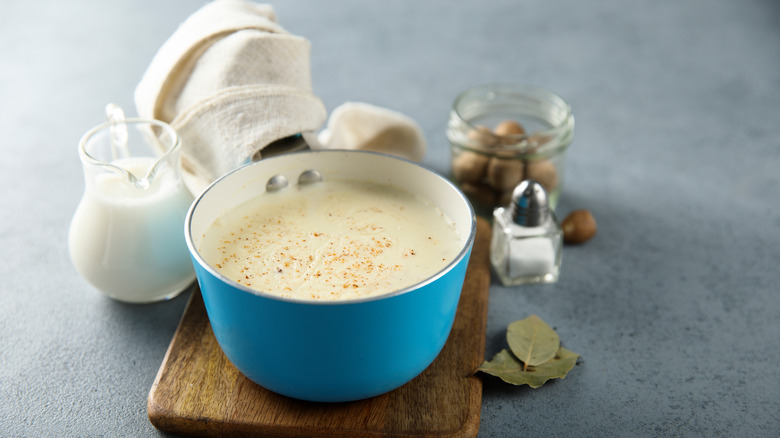 Béchamel sauce in blue saucepan