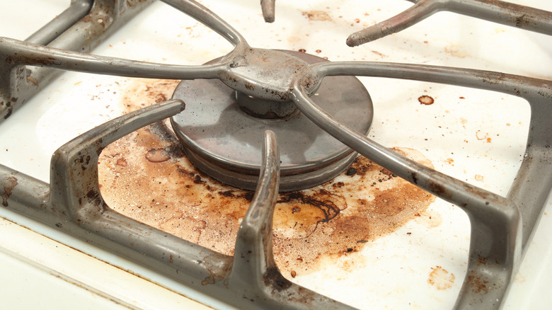 dirty gas stovetop without drip pans