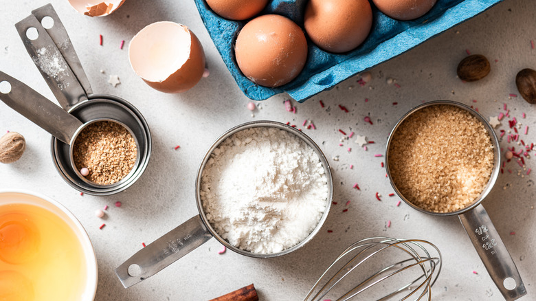 eggs and measuring cups of sugar