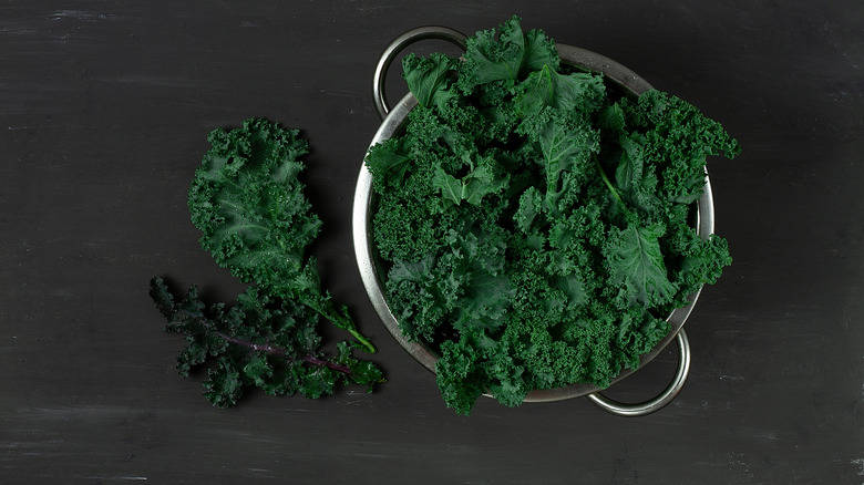 Kale leaves in a colander 