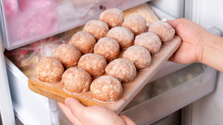 Meatballs being stored in refrigerator