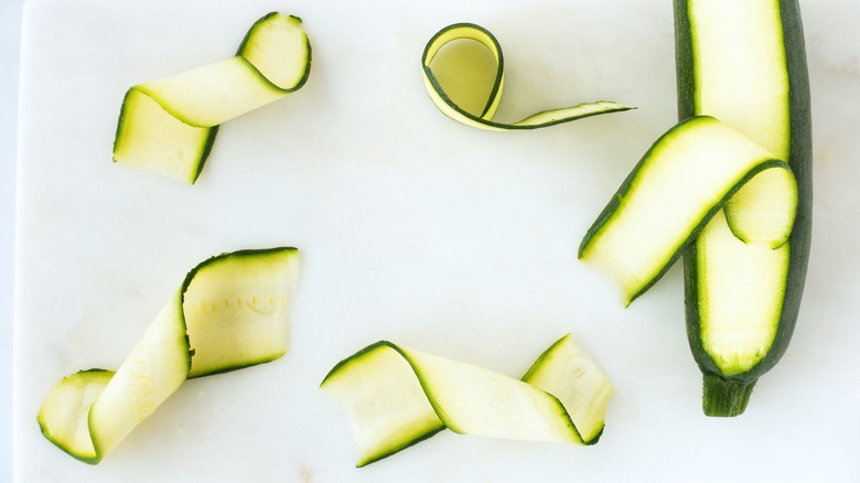 zucchini ribbons white background