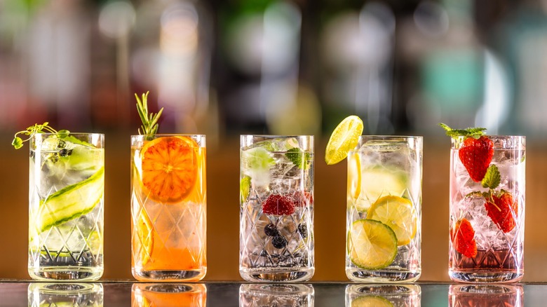 Five different fruit-garnished mocktails