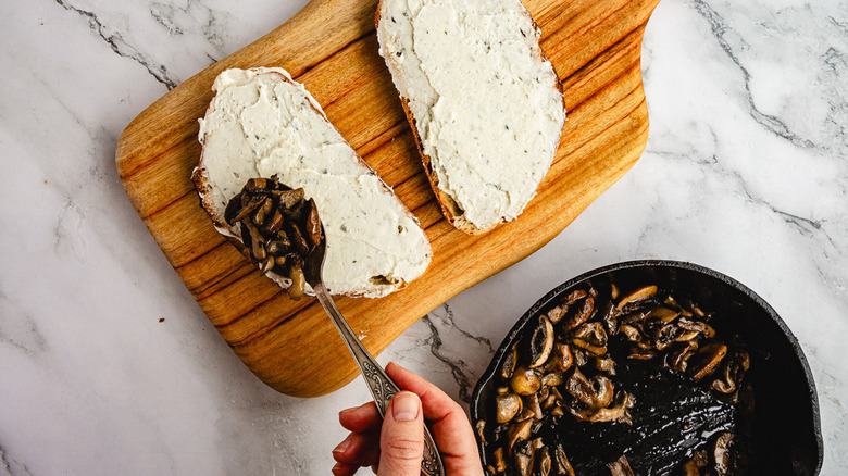 Topping bread with mushrooms