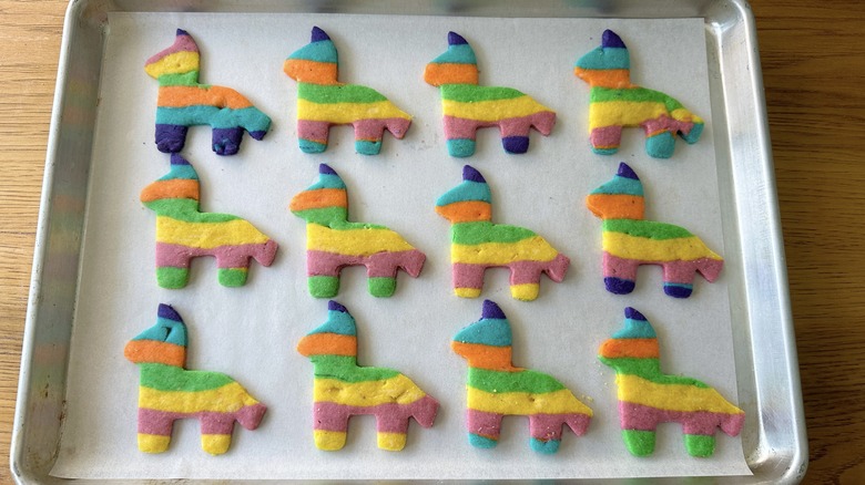 baked piñata cookies on tray