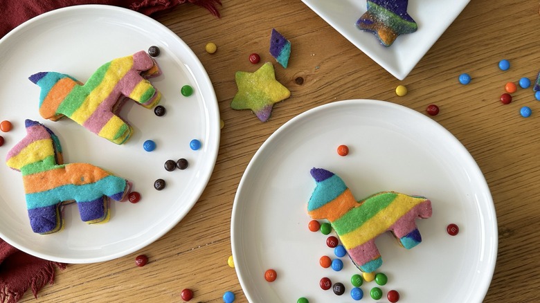 M&M's piñata cookies on plates