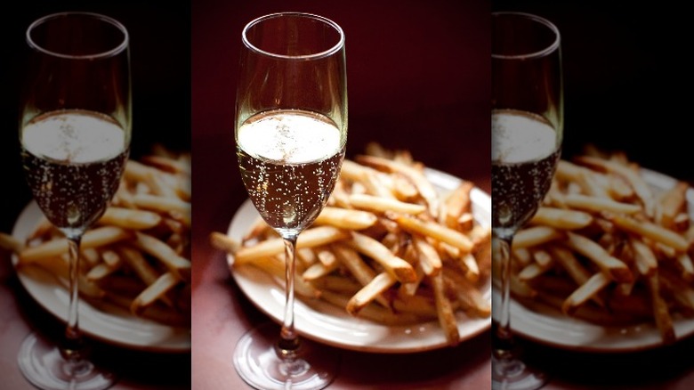 Champagne glass and fries