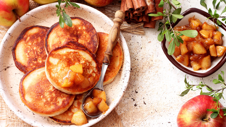 Pancakes and a bowl of caramelized apples