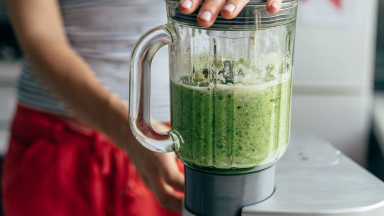 Green smoothie in blender