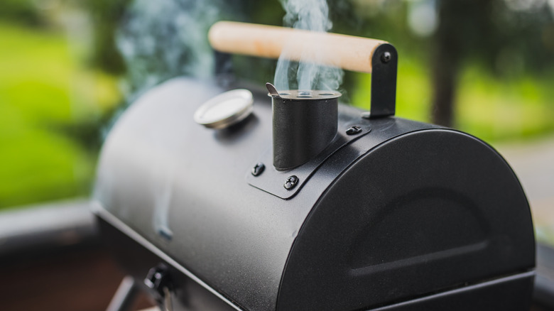 A meat smoker smoking