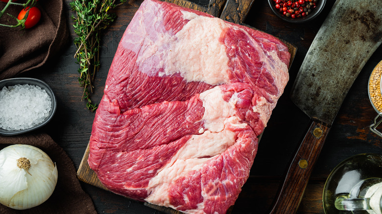 Raw beef brisket on a table