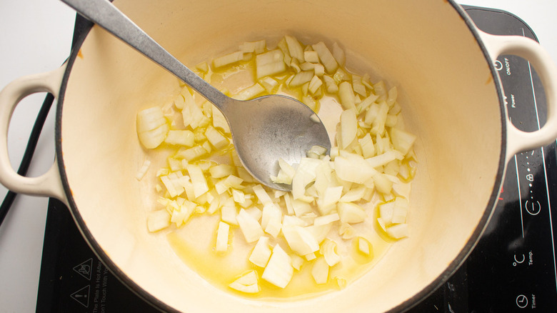 onion cooking in pot