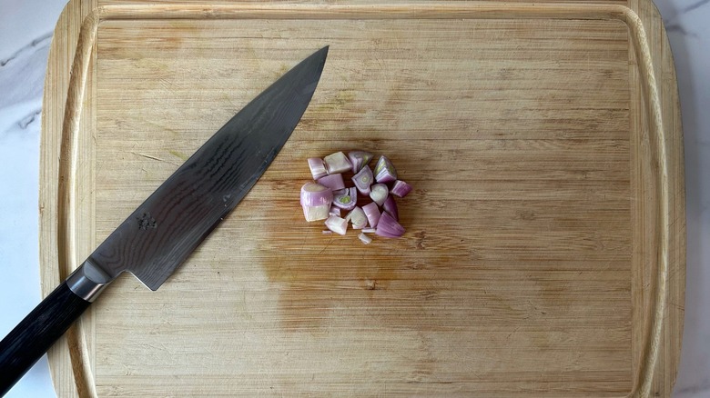 chopped shallot on cutting board