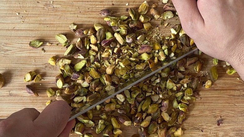 chopped pistachios on cutting board