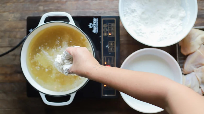 frying fried chicken 