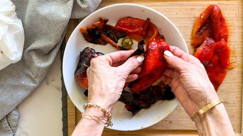 peeling the skin from bell peppers