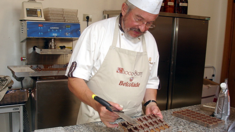 Pastry chef making chocolate