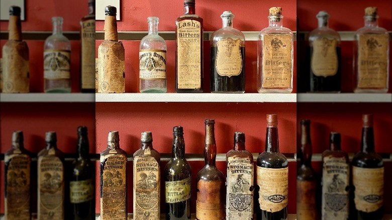 Old spirits bottles on shelf