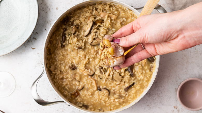 roasted garlic added to mushroom risotto