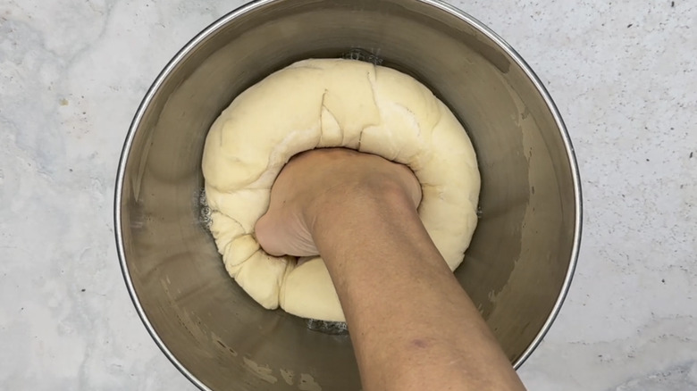 deflating dough