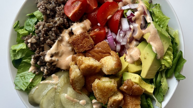 burger bowl with various toppings