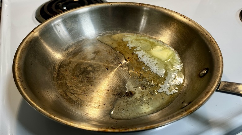 butter melting in skillet