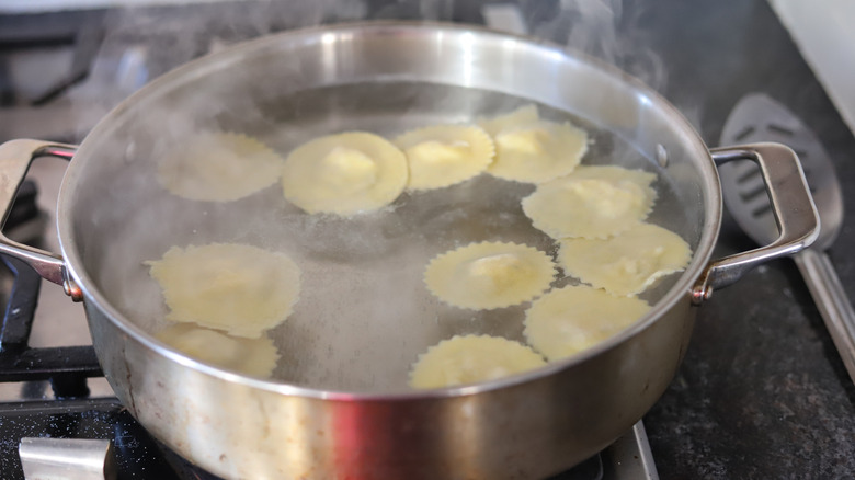 ravioli boiling in a pot